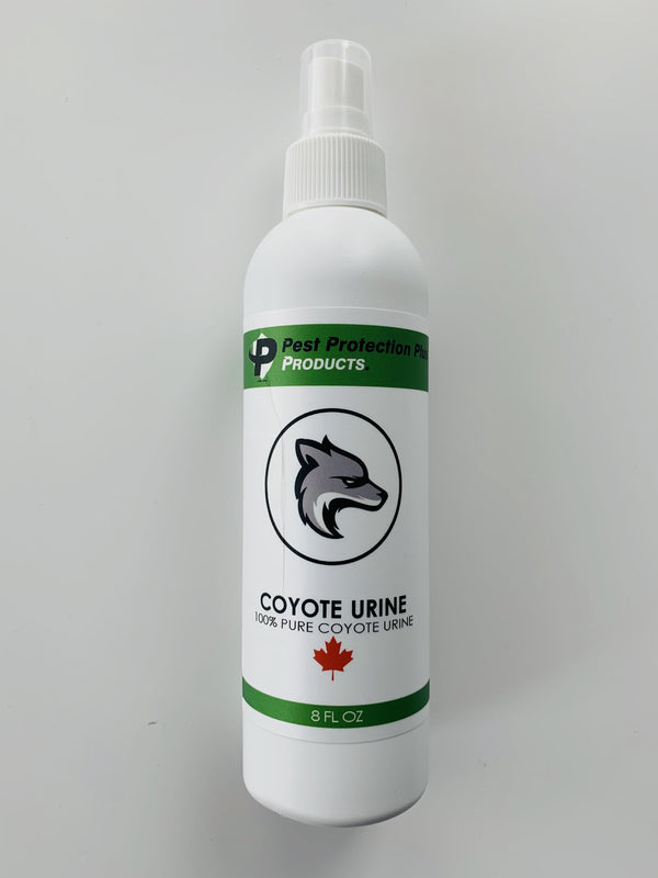 plastic bottle with 8 oz of coyote urine with spray nozzel